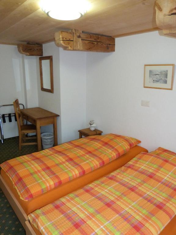 Hotel De Ville Rossinière Quarto foto