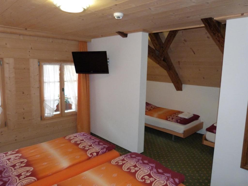 Hotel De Ville Rossinière Quarto foto